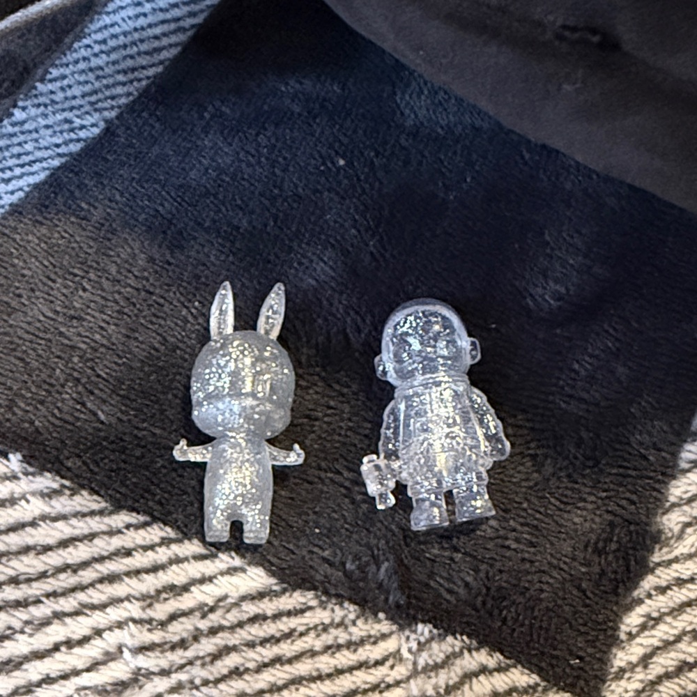 Clear Glitter Labubu and Space Molly figurines.  SUPER HARD TO GET